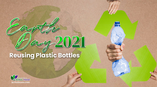 earth day reusing plastic bottles diy crafts with a plastic bottle upcycle it green earth silhouette over brown paper green recycling symbol cut out held up with hand squeezing plastic bottle