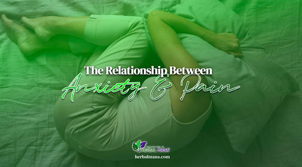 The Relationship Between Anxiety and Pain person curled in the fetal position in pain holding pillow over their head green overlay with text