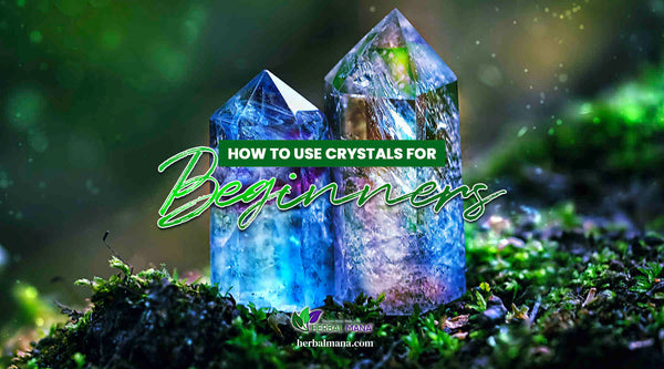 how to use crystals for beginners close up on two crystal towers with clear blue and purple on moss close up