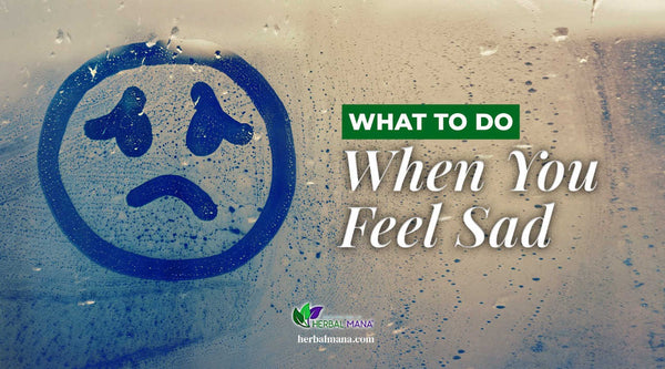 what to do when you feel sad dont know why frowny sad face drawn in the window fog close up white text overlay